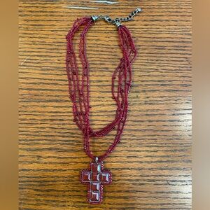 Red multi-strand beaded silver cross necklace